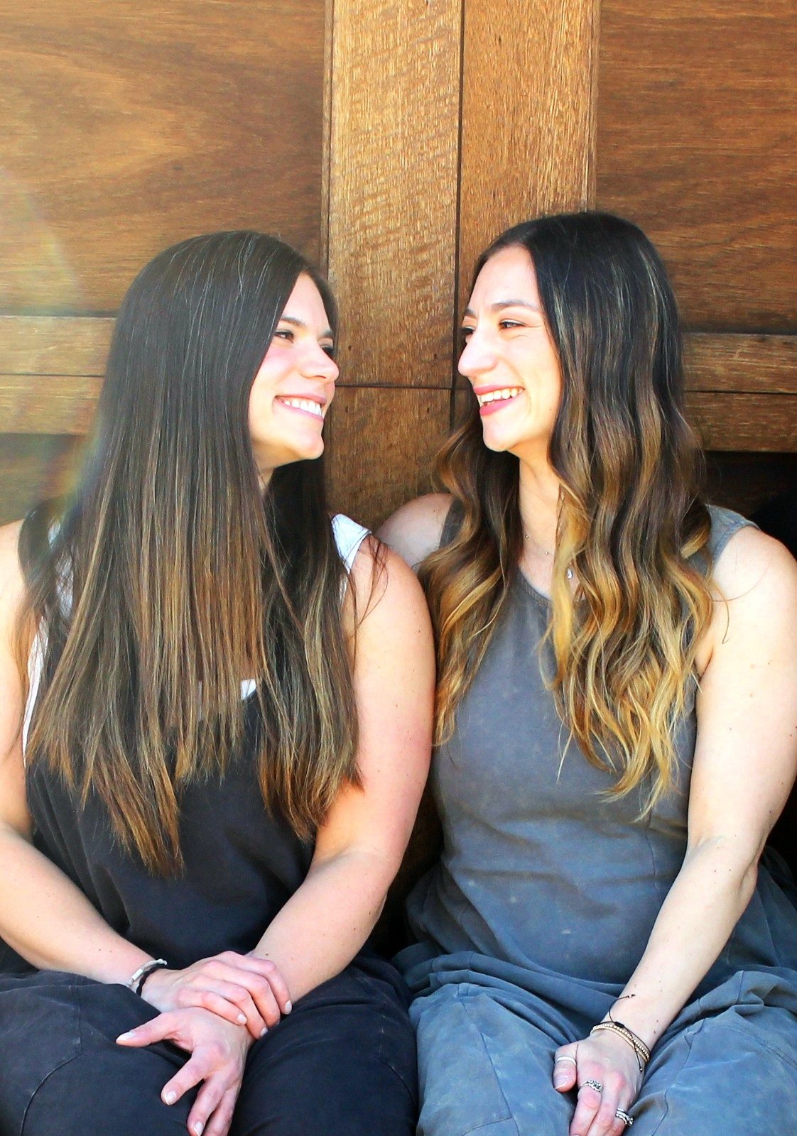 Sisters Sam and Kim Breslin laughing together